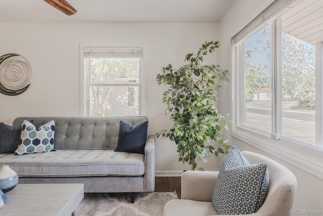 2260 Lilly Dr, Thornton, CO 80229 - living room with wood finished floors and healthy amount of natural light