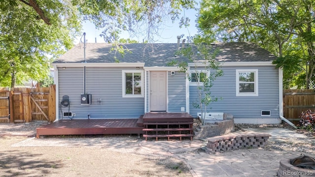 2260 Lilly Dr, Thornton, CO 80229 - rear view of property with a patio area, a fire pit, a deck, and roof with shingles