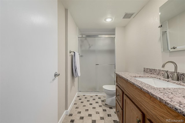 full bathroom with toilet, a shower stall, visible vents, and vanity