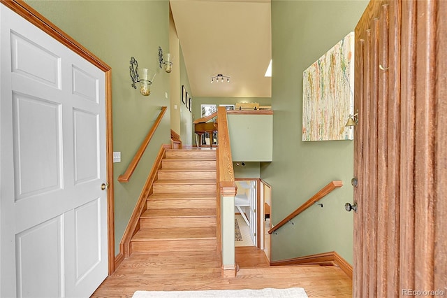 28065 Camel Heights Cir, Evergreen, CO 80439 - staircase featuring wood finished floors and baseboards