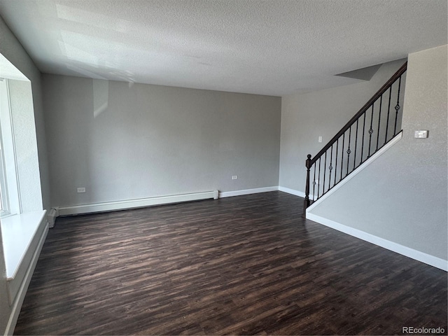 1285 Colorado Blvd Unit 3, Denver, CO 80206 - unfurnished living room with dark wood-type flooring, a baseboard radiator, stairway, and a textured ceiling