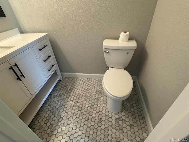 1285 Colorado Blvd Unit 3, Denver, CO 80206 - bathroom featuring vanity and a textured wall