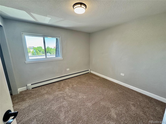 1285 Colorado Blvd Unit 3, Denver, CO 80206 - unfurnished room with baseboard heating, carpet floors, and a textured ceiling