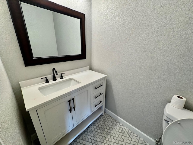 1285 Colorado Blvd Unit 3, Denver, CO 80206 - bathroom with vanity and a textured wall