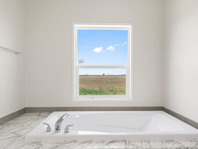 bathroom featuring a bath