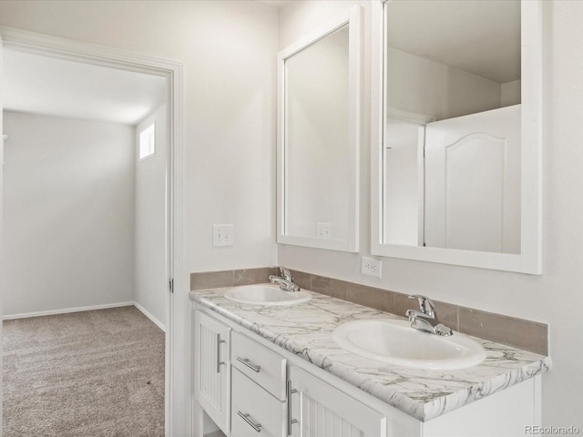 bathroom with dual bowl vanity