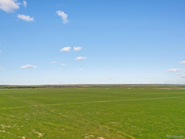 view of nearby features with a lawn