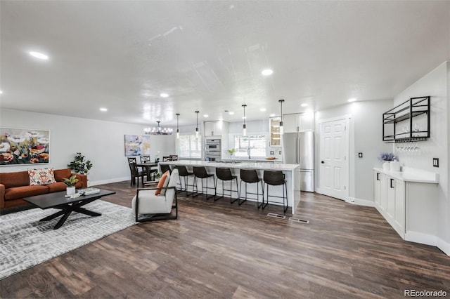 living room featuring dark hardwood / wood-style flooring