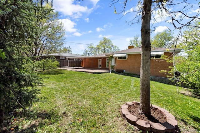 view of yard with a patio area