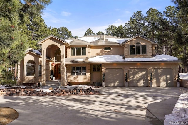 view of front of property featuring a garage