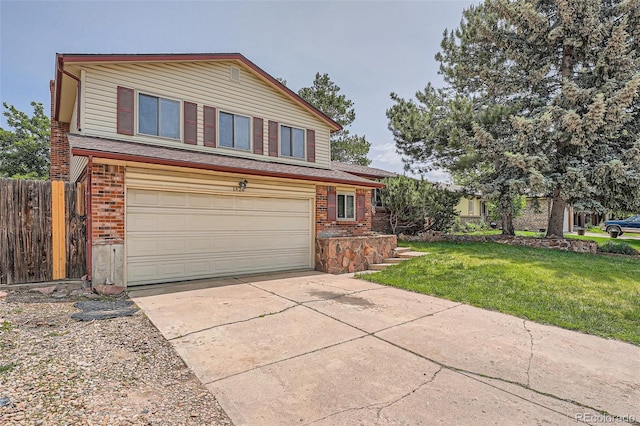 1824 S Granby St, Aurora, CO 80012 - view of front of home with driveway, brick siding, and an attached garage