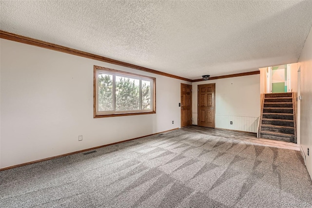 1824 S Granby St, Aurora, CO 80012 - carpeted spare room featuring a textured ceiling, stairway, crown molding, and baseboards