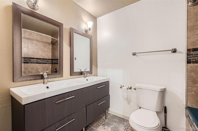 1824 S Granby St, Aurora, CO 80012 - bathroom with toilet, double vanity, and tiled shower