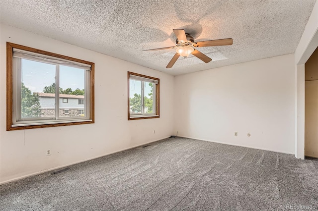 1824 S Granby St, Aurora, CO 80012 - empty room featuring carpet flooring, ceiling fan, a textured ceiling, and baseboards