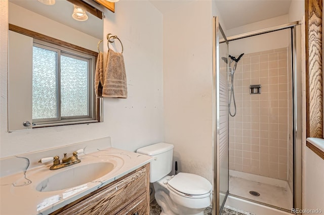 1824 S Granby St, Aurora, CO 80012 - bathroom with toilet, a stall shower, and vanity