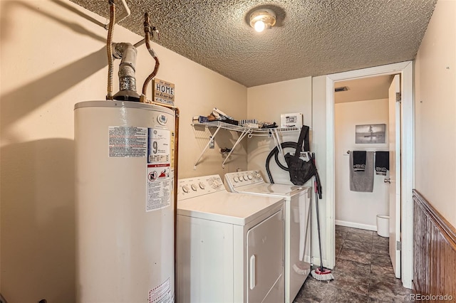 1824 S Granby St, Aurora, CO 80012 - laundry area featuring water heater, separate washer and dryer, and a textured ceiling