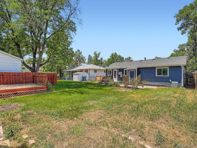 3750 S Galapago St, Englewood, CO 80110 - rear view of house featuring a fenced backyard