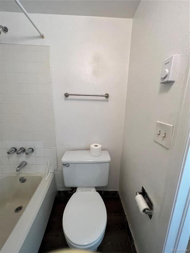 14852 E Kentucky Dr Unit 934, Aurora, CO 80012 - bathroom featuring tub / shower combination and toilet
