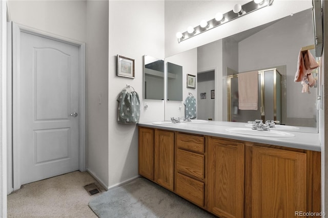 full bath featuring double vanity, carpet, a sink, and visible vents