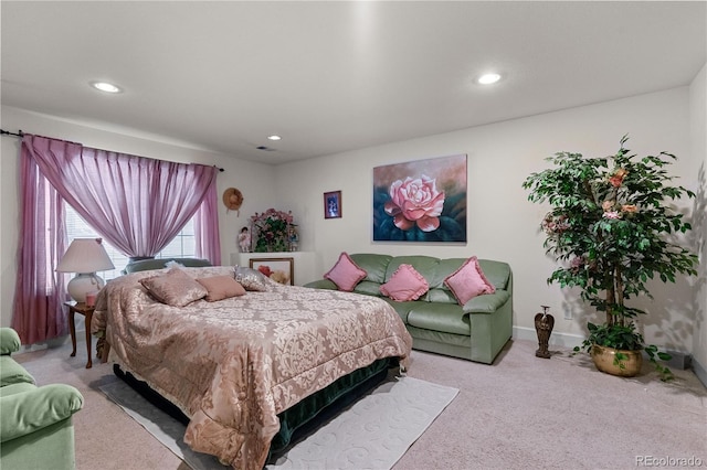 bedroom featuring recessed lighting, baseboards, and light colored carpet