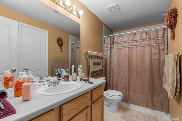 full bath with visible vents, toilet, a shower with curtain, tile patterned floors, and vanity