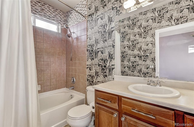 full bathroom featuring vanity, toilet, and shower / bath combo with shower curtain