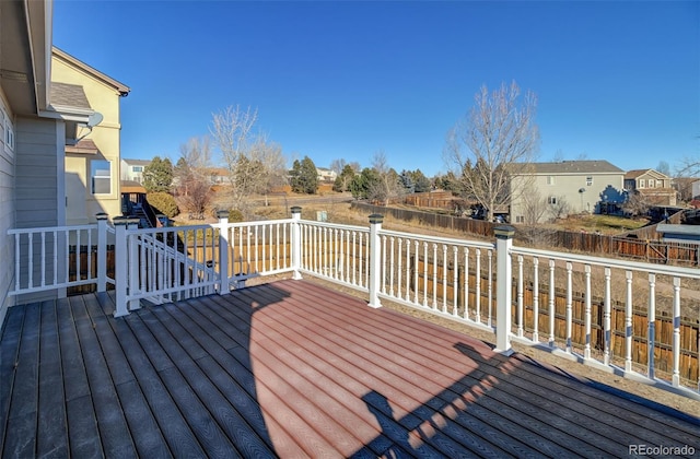 wooden terrace with a playground