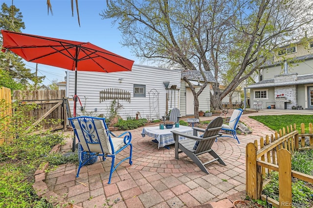 view of patio / terrace with fence