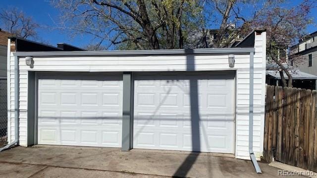 garage featuring fence