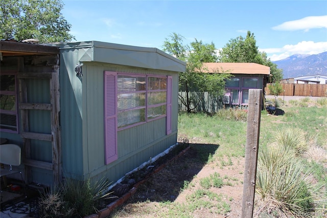 view of outdoor structure with a mountain view