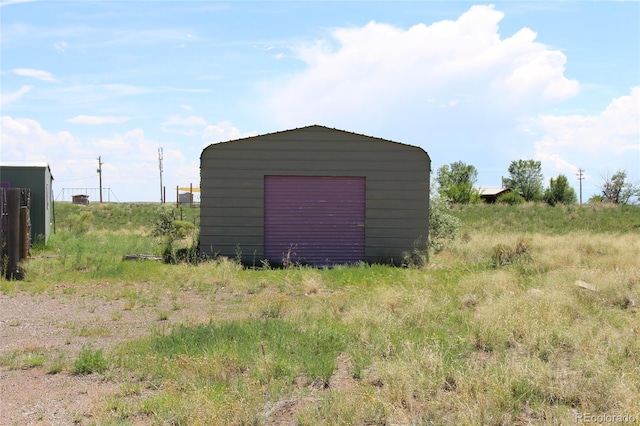 view of outdoor structure featuring a garage