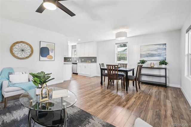 112 S Hooker St, Denver, CO 80219 - living room featuring wood finished floors and ceiling fan