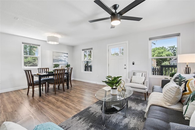 112 S Hooker St, Denver, CO 80219 - living room with plenty of natural light, wood finished floors, and ceiling fan