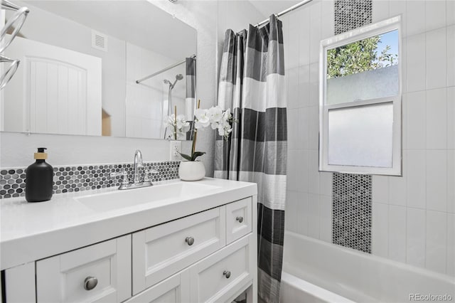 112 S Hooker St, Denver, CO 80219 - full bath featuring shower / bath combo with shower curtain and vanity