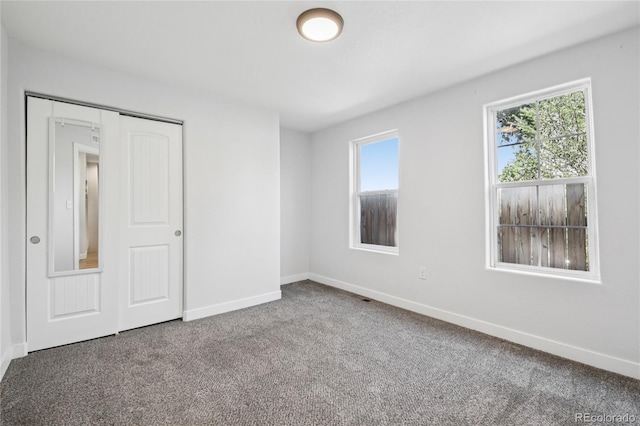 112 S Hooker St, Denver, CO 80219 - unfurnished bedroom featuring carpet and a closet