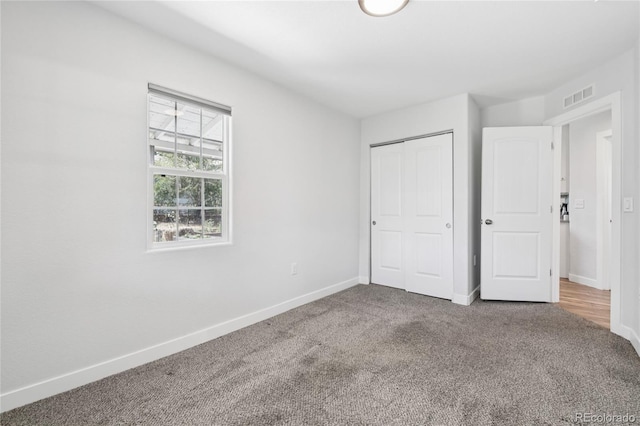 112 S Hooker St, Denver, CO 80219 - unfurnished bedroom with carpet flooring and a closet