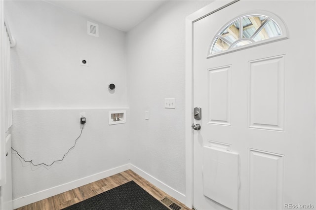 112 S Hooker St, Denver, CO 80219 - laundry area with electric dryer hookup, light wood-style flooring, and hookup for a washing machine