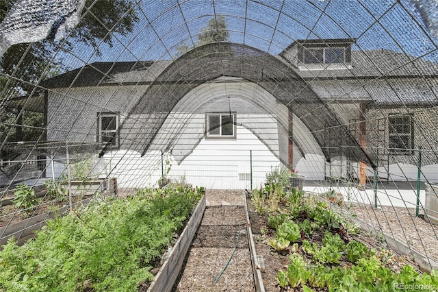 112 S Hooker St, Denver, CO 80219 - view of side of property featuring a vegetable garden