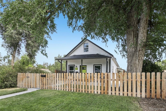 112 S Hooker St, Denver, CO 80219 - view of home's exterior with a fenced front yard
