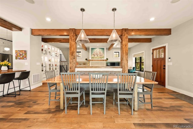 700 Cheyenne St, Golden, CO 80401 - dining space featuring baseboards, beamed ceiling, recessed lighting, and wood finished floors