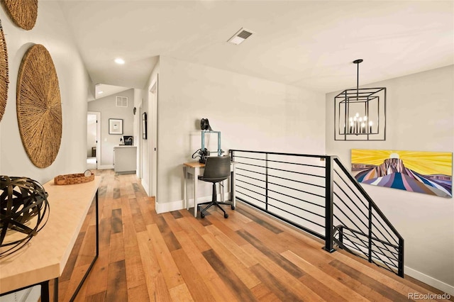 700 Cheyenne St, Golden, CO 80401 - hallway with a chandelier, recessed lighting, an upstairs landing, wood finished floors, and visible vents