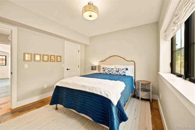 700 Cheyenne St, Golden, CO 80401 - bedroom with baseboards and wood finished floors