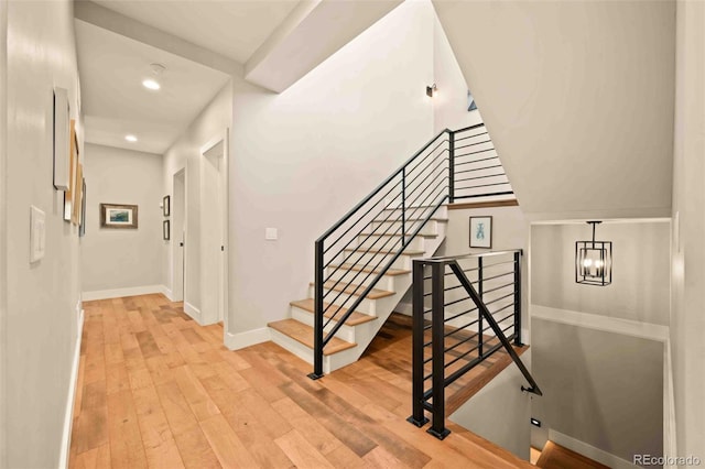 700 Cheyenne St, Golden, CO 80401 - stairway with baseboards, recessed lighting, and wood finished floors