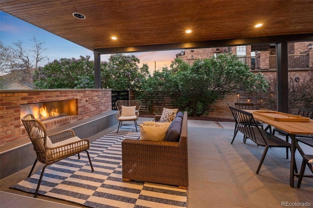 700 Cheyenne St, Golden, CO 80401 - view of patio with outdoor dining space and an outdoor brick fireplace