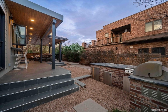 700 Cheyenne St, Golden, CO 80401 - view of patio / terrace with exterior kitchen and area for grilling