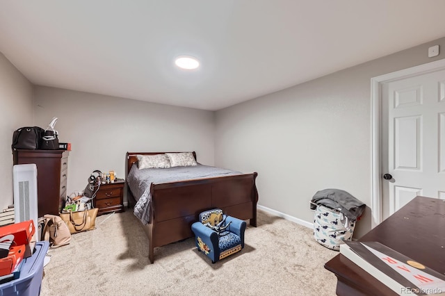 15047 E Louisiana Dr Unit A, Aurora, CO 80012 - carpeted bedroom featuring baseboards