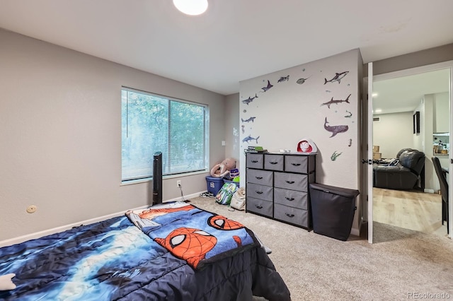 15047 E Louisiana Dr Unit A, Aurora, CO 80012 - carpeted bedroom with baseboards