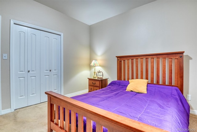 carpeted bedroom with a closet