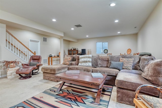 living room featuring light carpet