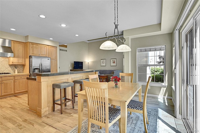 14878 E Aberdeen Ave, Centennial, CO 80016 - dining space featuring recessed lighting, light wood-type flooring, and baseboards